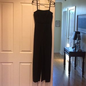 Convertible black strapless split leg jumpsuit